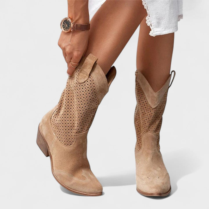 Stylish women's mid-calf boots, perforated design, comfortable stable block heel & rounded toe for fall fashion.