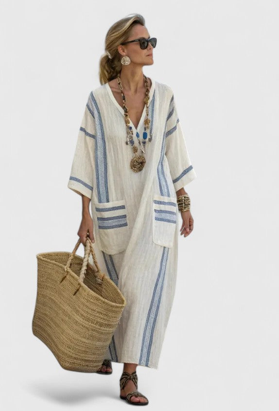 Comfortable striped V-neck sundress. Flowing maxi kaftan, versatile women's summer dress for beach or casual.