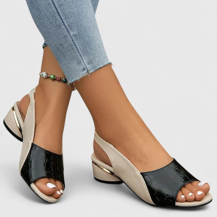 Elegant women's open-toe summer sandals, perfect for casual or dressy wear, featuring comfortable design.