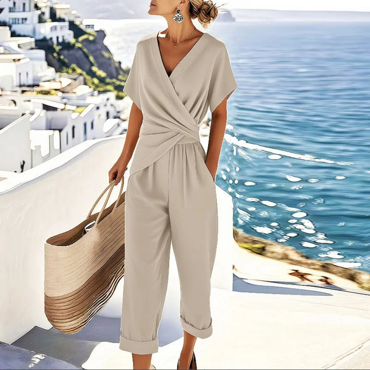 Elegant women's two-piece set featuring a chic wrap top and comfortable cropped pants, ideal for versatile summer wear.