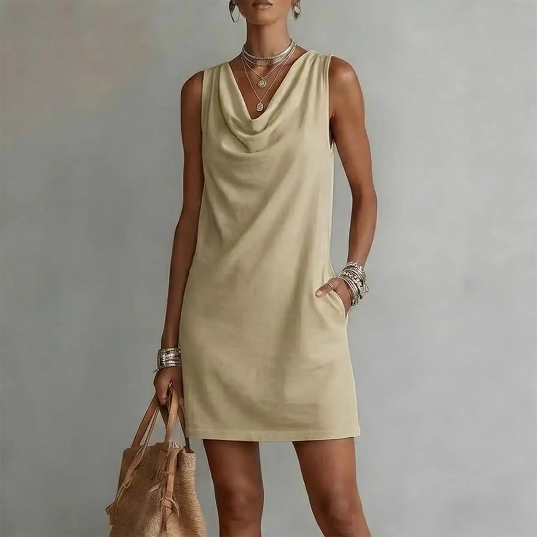 Summer essential: women's cowl neck mini dress with pockets. Sleeveless, relaxed A-line fit, perfect weekend outfit.