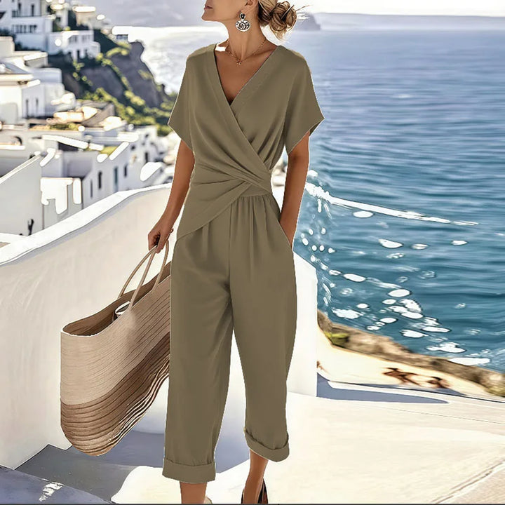 Blue women's elegant two-piece set with a flattering wrap top and comfortable cropped pants for modern style.