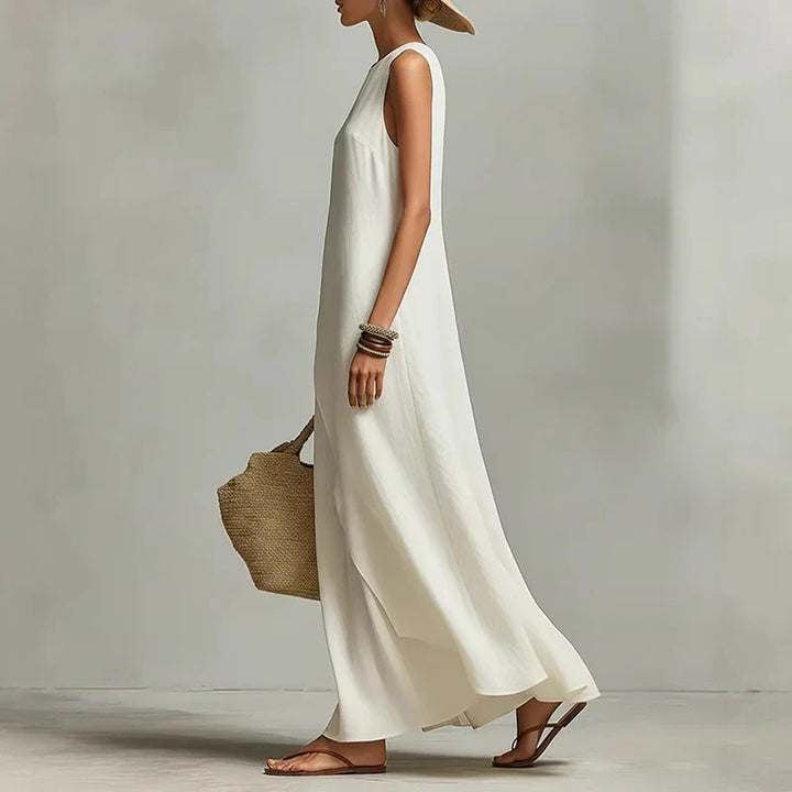 Stylish women's asymmetrical sleeveless maxi dress, a comfortable & elegant round neck option for summer.