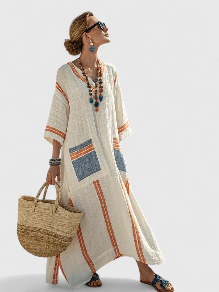 Casual striped V-neck maxi dress. Comfortable kaftan sundress, perfect women's beachwear and summer fashion.