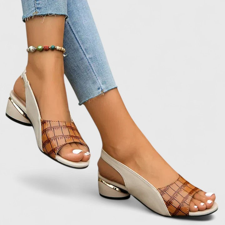 Stylish women's open-toe flat sandals for summer, offering comfort, elegance, and non-slip stability for daily wear.