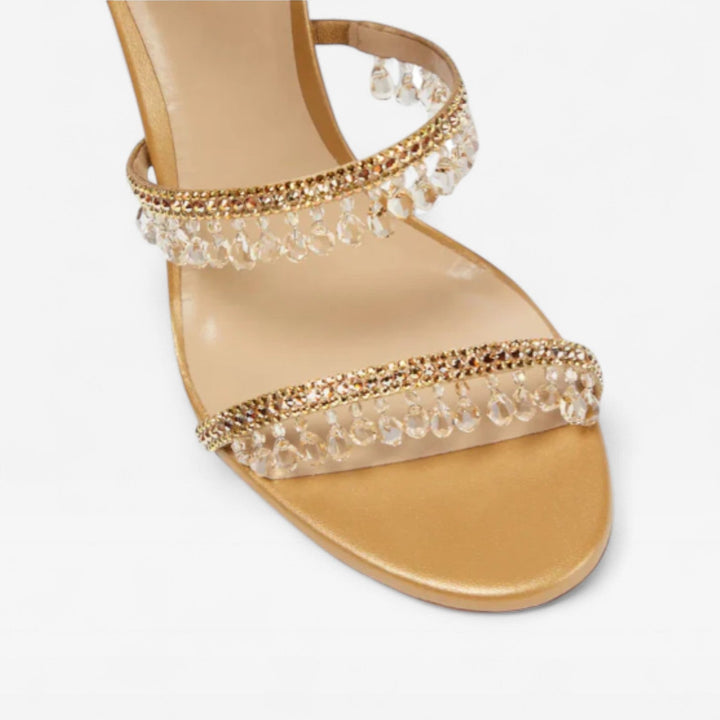 Chic women's sparkling strappy high heel sandals, adding elegance to any formal or party outfit.
