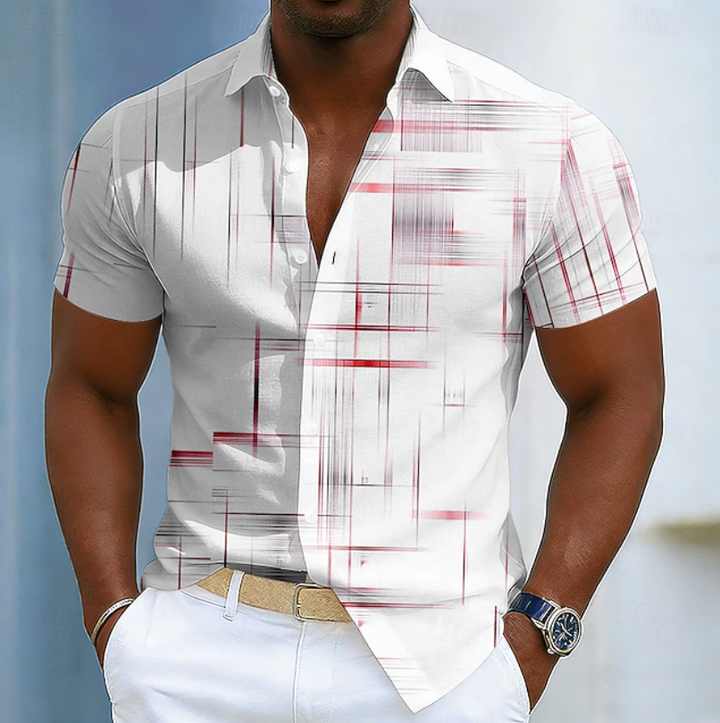Patterned men's short sleeve button shirt with a bold geometric print. A stylish and comfortable summer top.