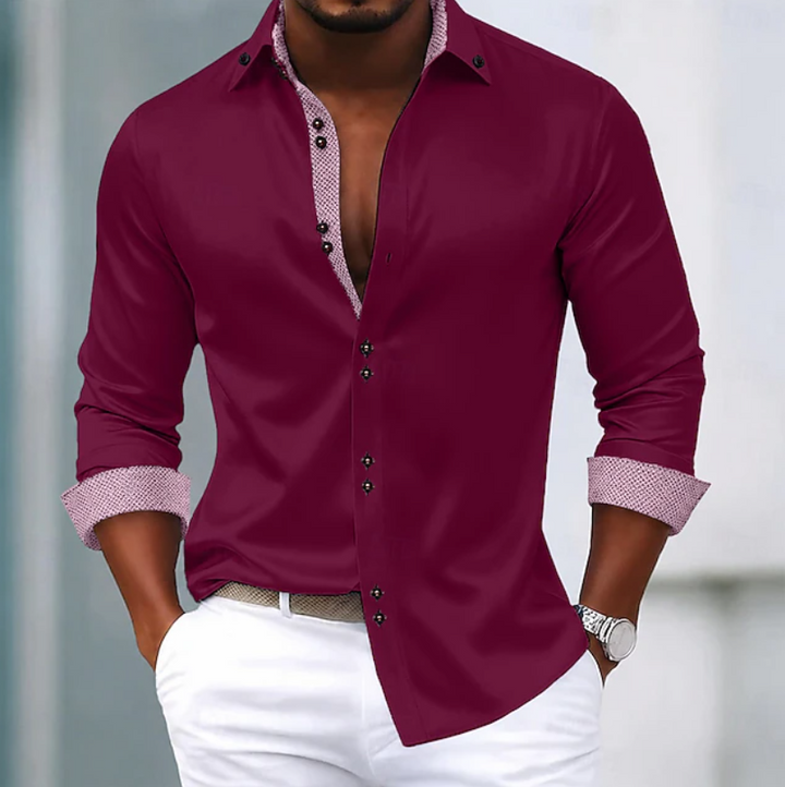 Slim fit men's button-down shirt with a classic collar, ideal for a modern and refined everyday or business casual outfit.
