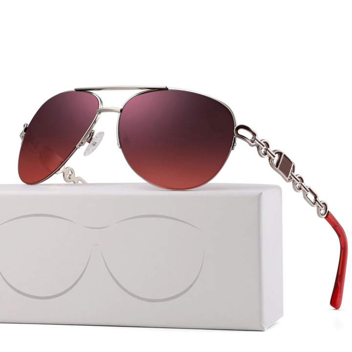 Trendy women's sunglasses with polarized lenses, ideal for reducing glare and blocking harmful UV rays.