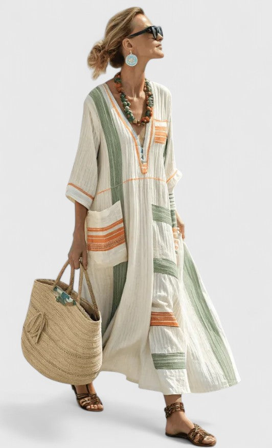Flowing V-neck striped maxi kaftan sundress. A chic and comfortable summer dress for women's casual elegance.