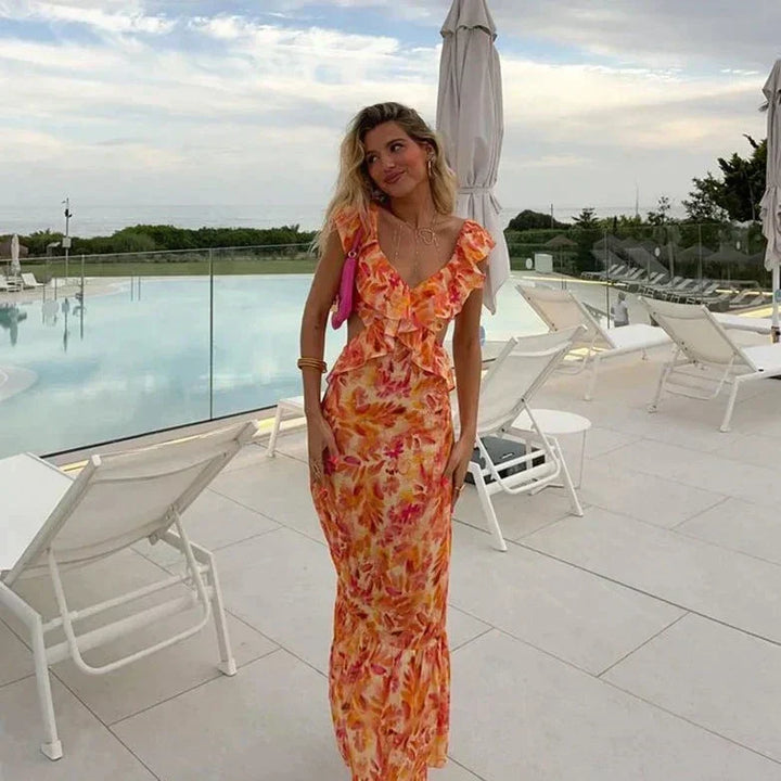 Elegant women's floral ruffled maxi dress with a flattering V-neck, perfect for summer events & garden parties.
