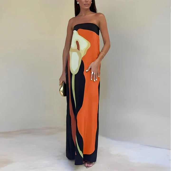 Printed strapless maxi dress, an elegant formal wear choice for women, perfect as a wedding guest.
