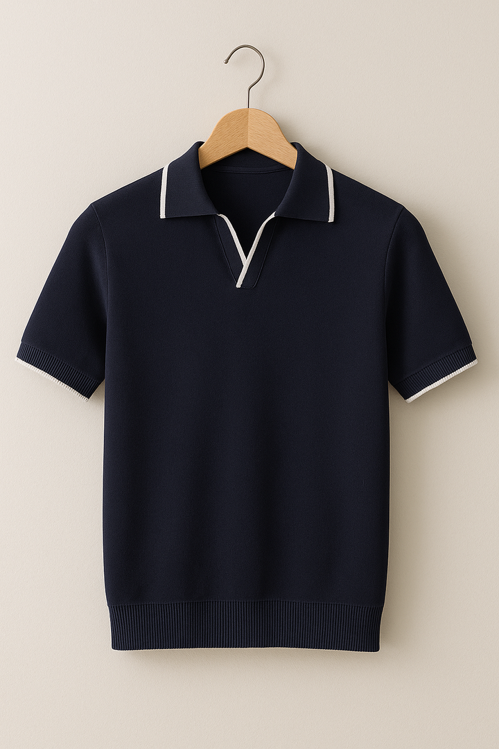 Modern men's slim fit polo shirt in black, featuring a subtle contrast trim for a sleek, contemporary style.