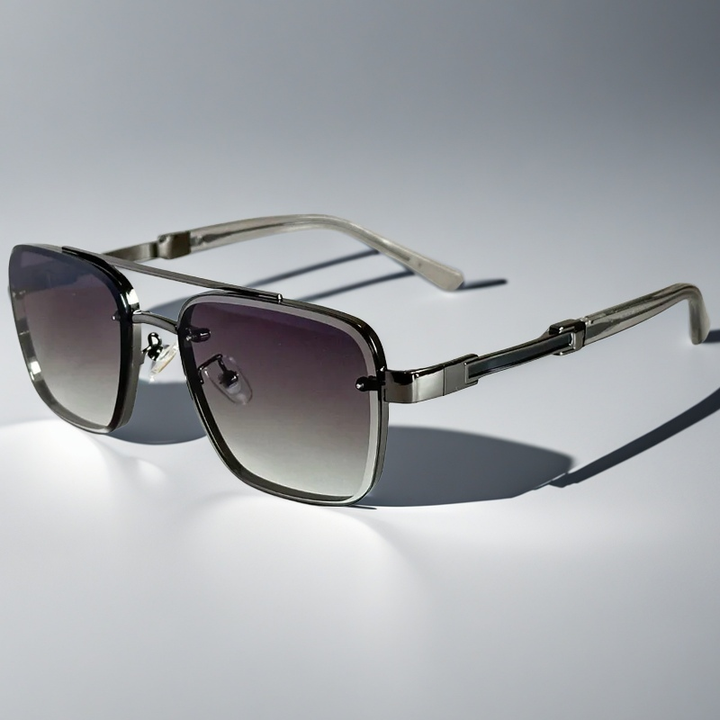Fashionable unisex squared frame sunglasses offering UV protection. Lightweight & comfortable design for summer chic.