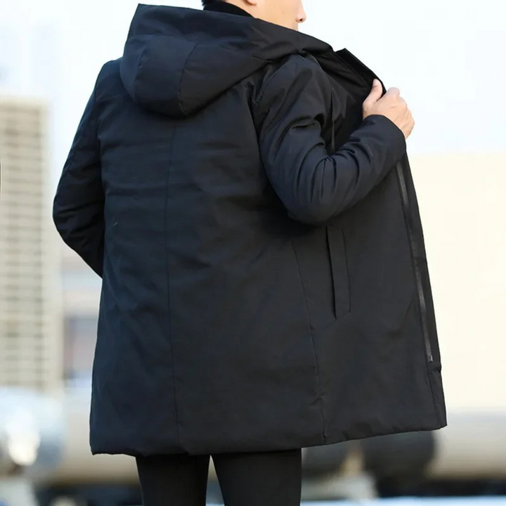 Stylish men's quilted mid-length hooded coat, perfect for cold weather. Essential casual winter jacket outerwear.
