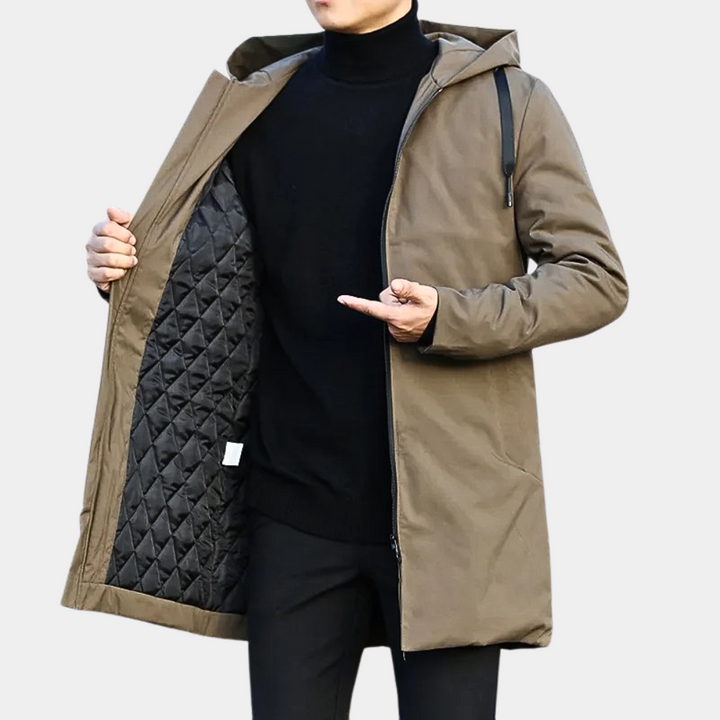 Durable men's mid-length quilted coat with hood, a practical and stylish zip-up jacket for winter outerwear.