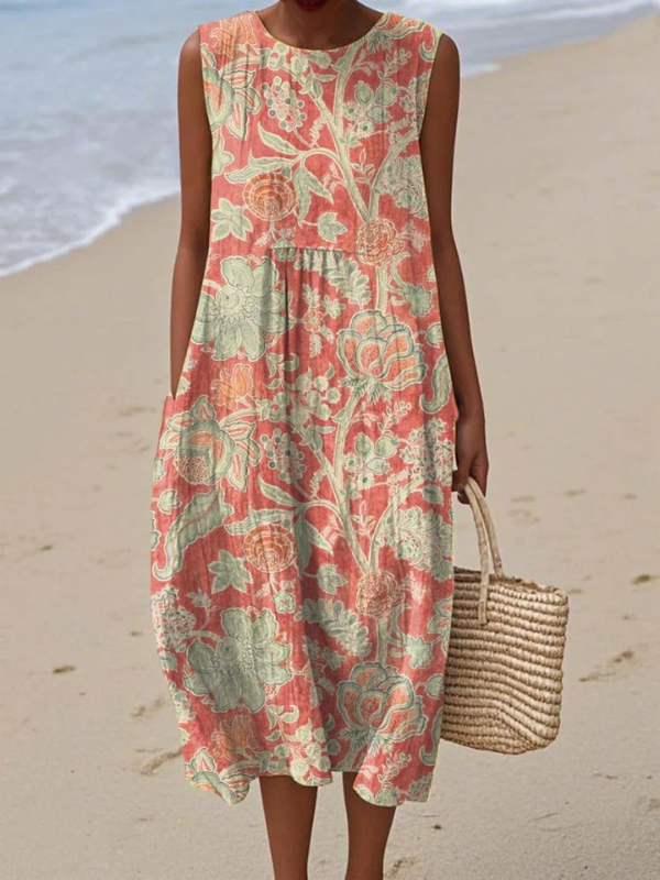 Elegant women's floral midi dress for spring/summer. Comfortable patterned day dress, perfect for casual or everyday style.