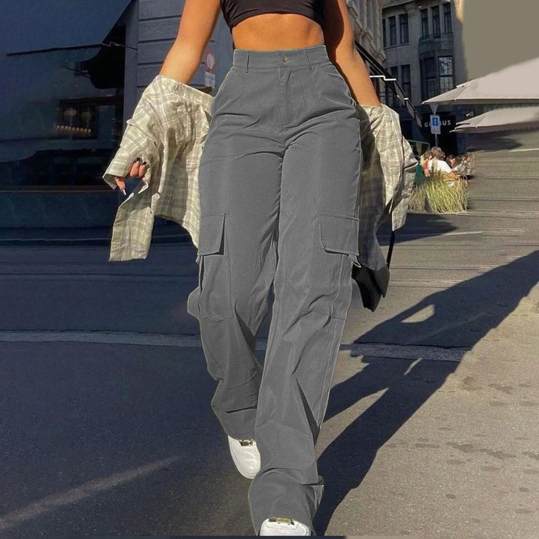 Fashionable women's high-waist cargo pants, relaxed fit, trendy streetwear look, comfortable for daily wear.