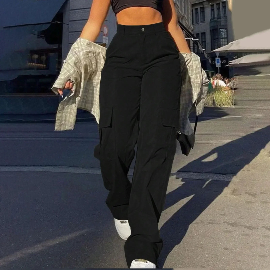 Women's high-waist relaxed fit cargo trousers with ample utility pockets for a modern and practical look.
