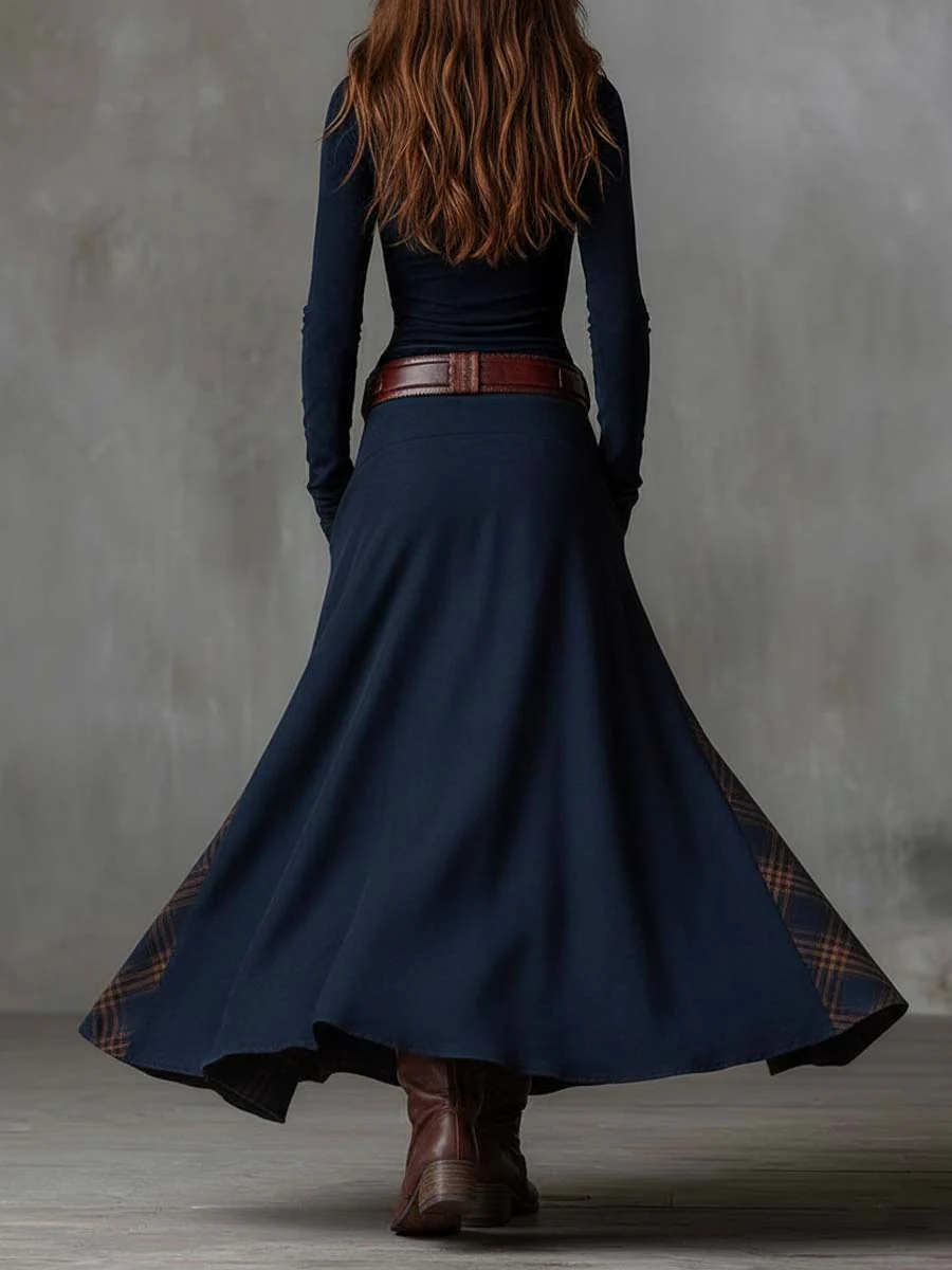 Timeless women's belted midi dress, suitable for casual outings or work. Elegant autumn fashion.