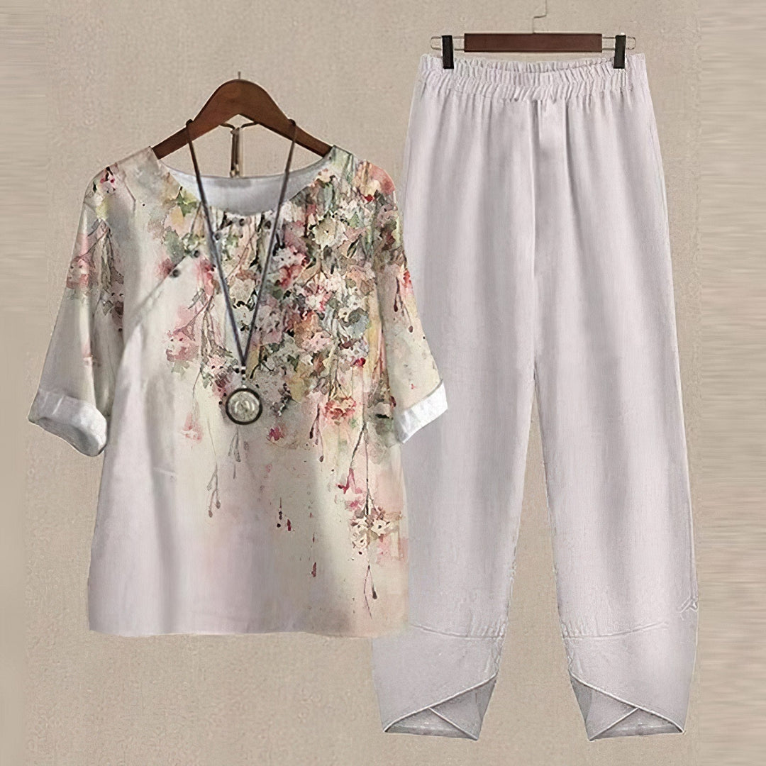 Comfortable women's relaxed fit shirt & trouser set. Perfect for casual summer style, offering chic and easy wear.