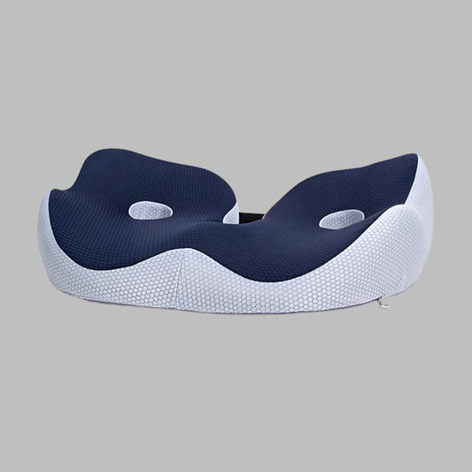 Adjustable memory foam seat cushion for tailbone relief on an office chair, promoting posture correction.