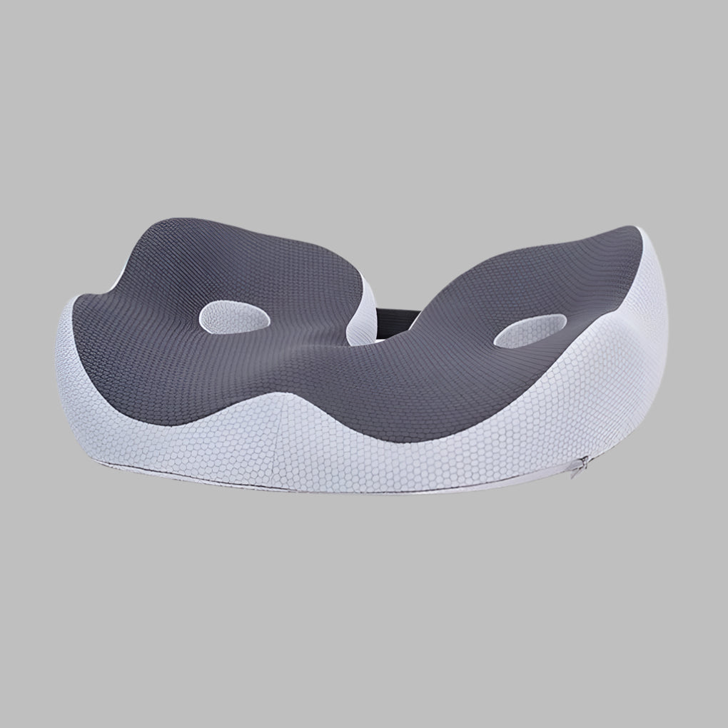 Ergonomic memory foam coccyx cushion for car seat pain relief, offering portable support.