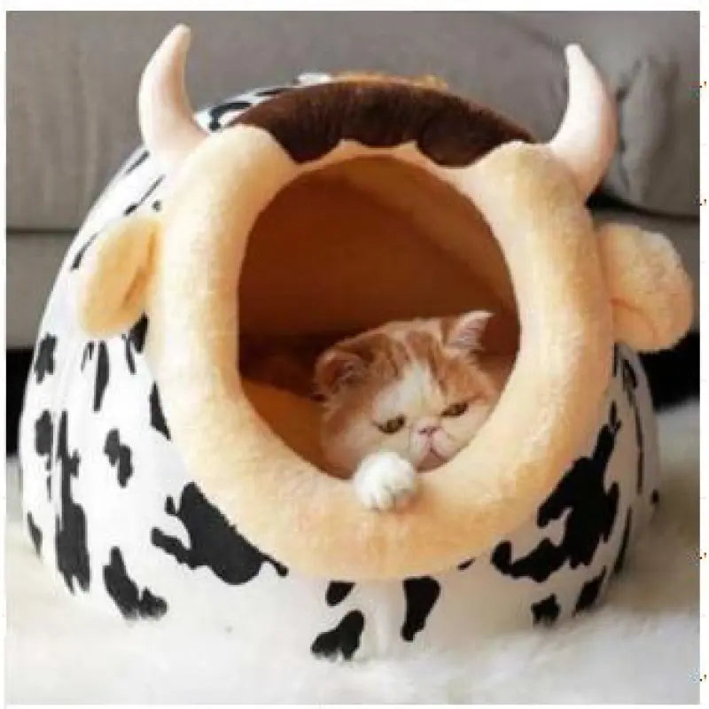 Adorable cow design plush cat bed with ears & horns, perfect for small cats & kittens. Cozy & washable pet furniture.
