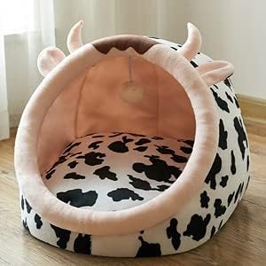 Unique cow design cat bed with prominent ears & horns. This cozy, plush pet bed is perfect for small cats.
