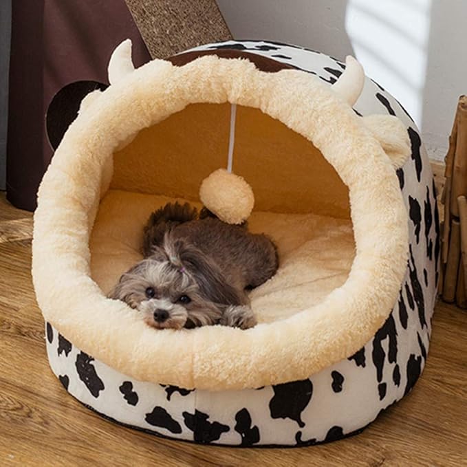 Adorable black and white cow print cat bed with cute ears & horns. A plush, cozy animal bed for kittens & small cats.
