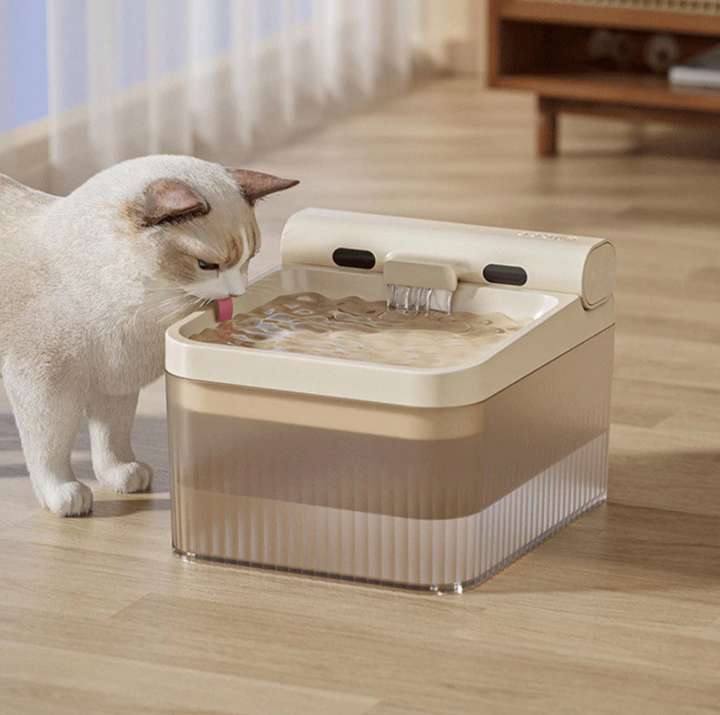 Adorable elephant pet water fountain for cats & dogs, providing fresh running water & triple filtration.