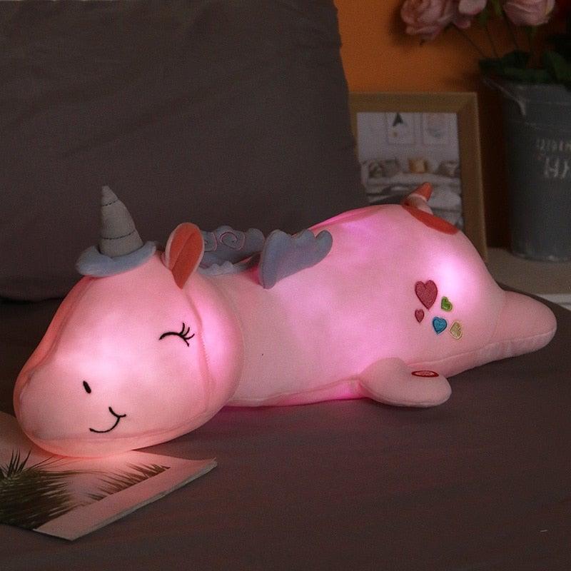 Adorable plush light-up unicorn stuffed animal for kids, soft and cuddly comfort toy.