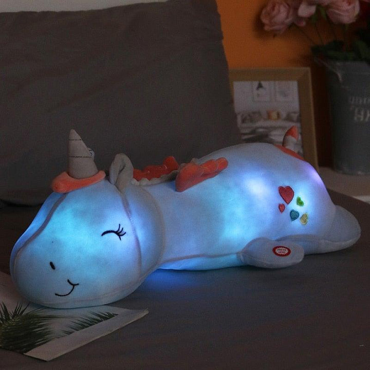 Magical glowing unicorn plush toy, the perfect soft stuffed animal gift for kids.