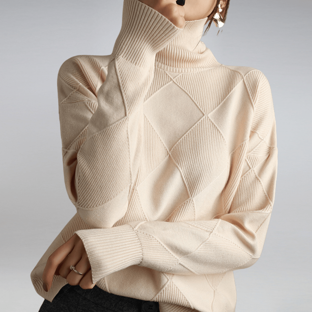 Woman wearing Alice soft cashmere blend turtleneck sweater, styled casually with jeans, versatile knitwear