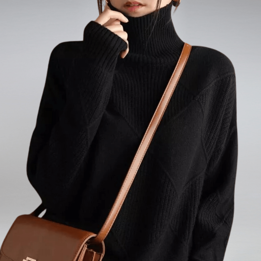 Alice women's soft cashmere blend turtleneck sweater folded neatly, showcasing quality and warmth, knitwear