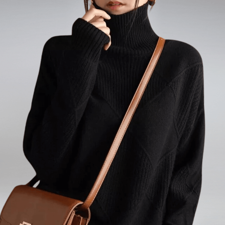 Alice women's soft cashmere blend turtleneck sweater folded neatly, showcasing quality and warmth, knitwear
