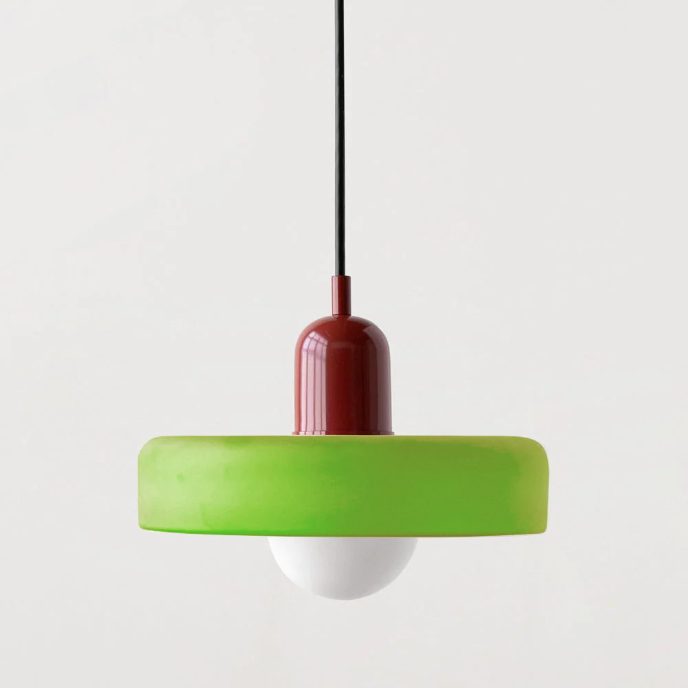 Elegant Bauhaus pendant light, colored glass, warm ambient glow.