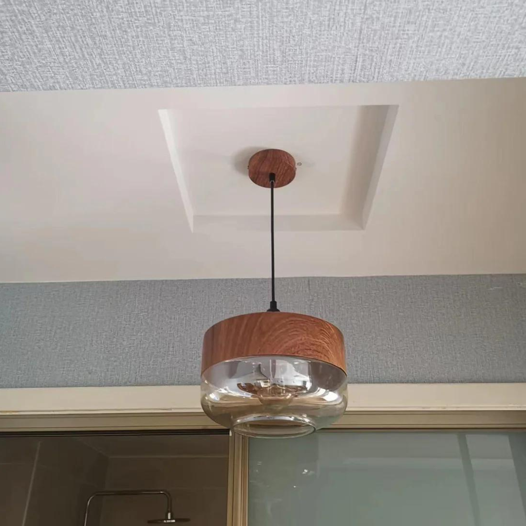 Arven Scandinavian Pendant Light: wooden design, warm ambient glow for modern interiors.