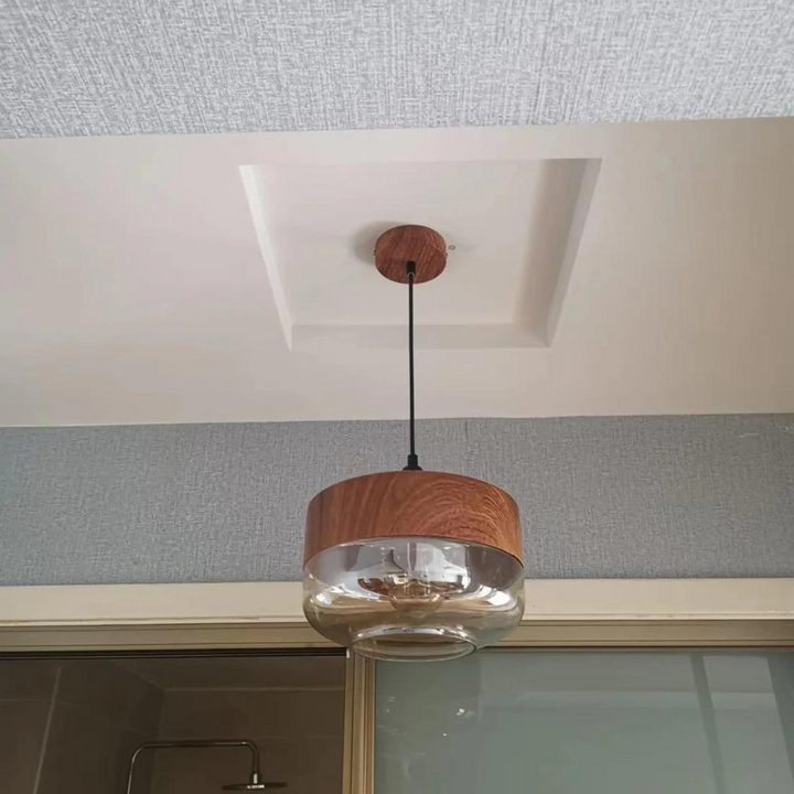 Arven Scandinavian Pendant Light: wooden design, warm ambient glow for modern interiors.