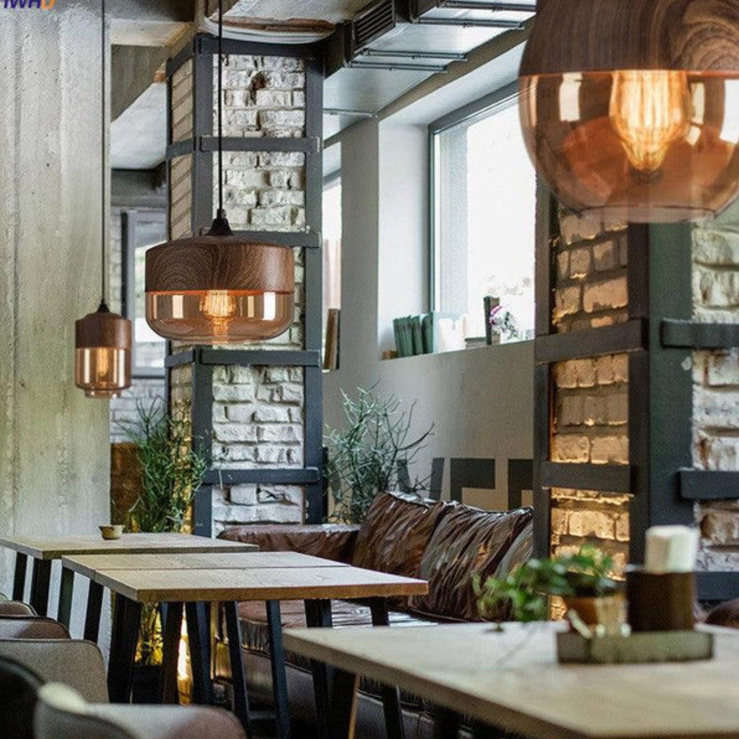 Close-up: Arven wooden pendant light showcasing natural wood grain & glass detail.