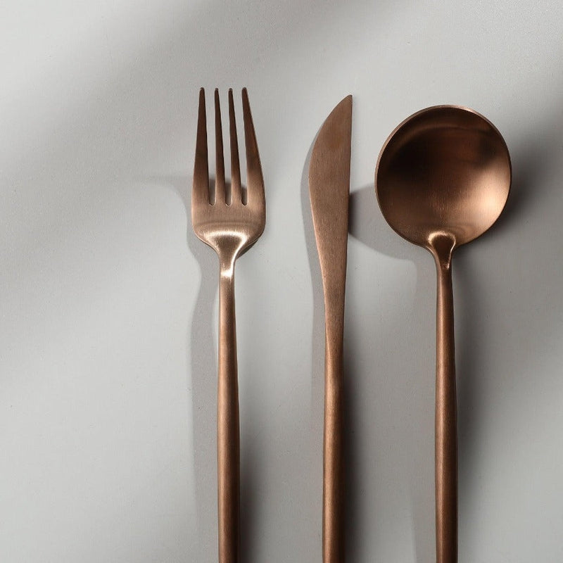 The polished finish of the Aurora Modern Cutlery Set, enhancing any table setting.