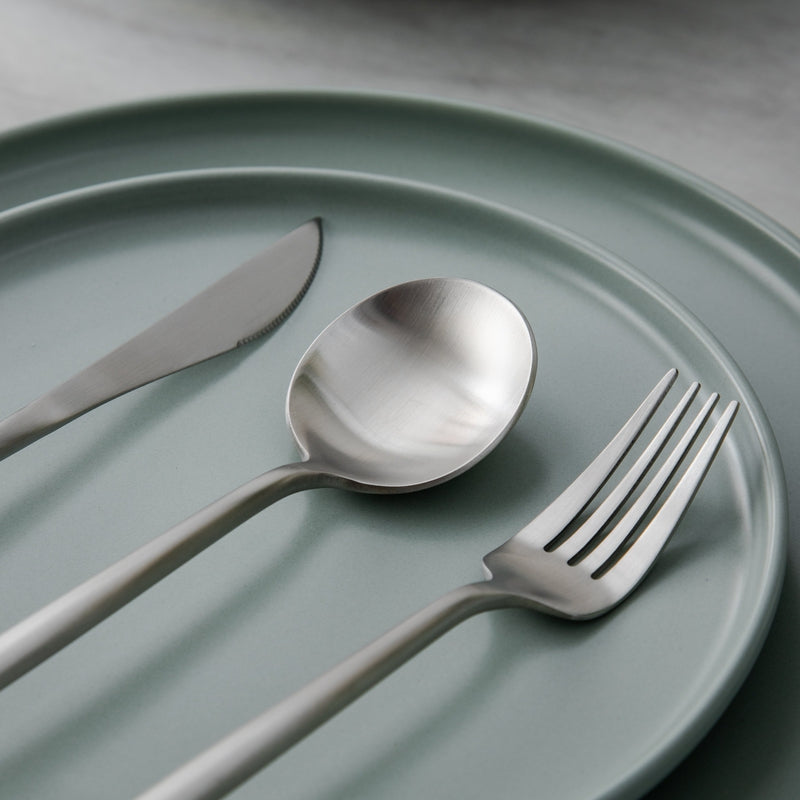 Modern Aurora tableware, showcasing its minimalist beauty on a clean background.