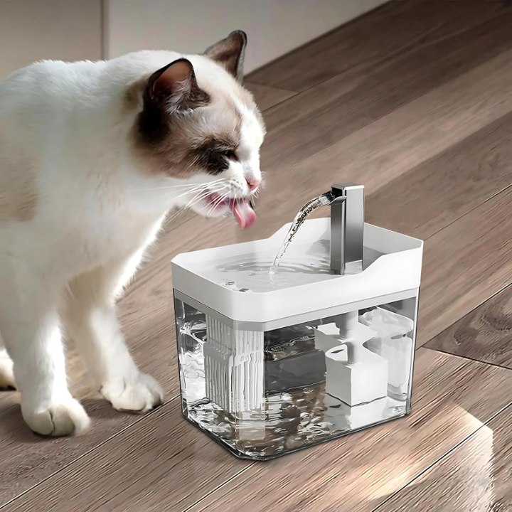 Automatic pet water fountain for dogs & cats, providing fresh, filtered drinking water. Essential pet hydration.