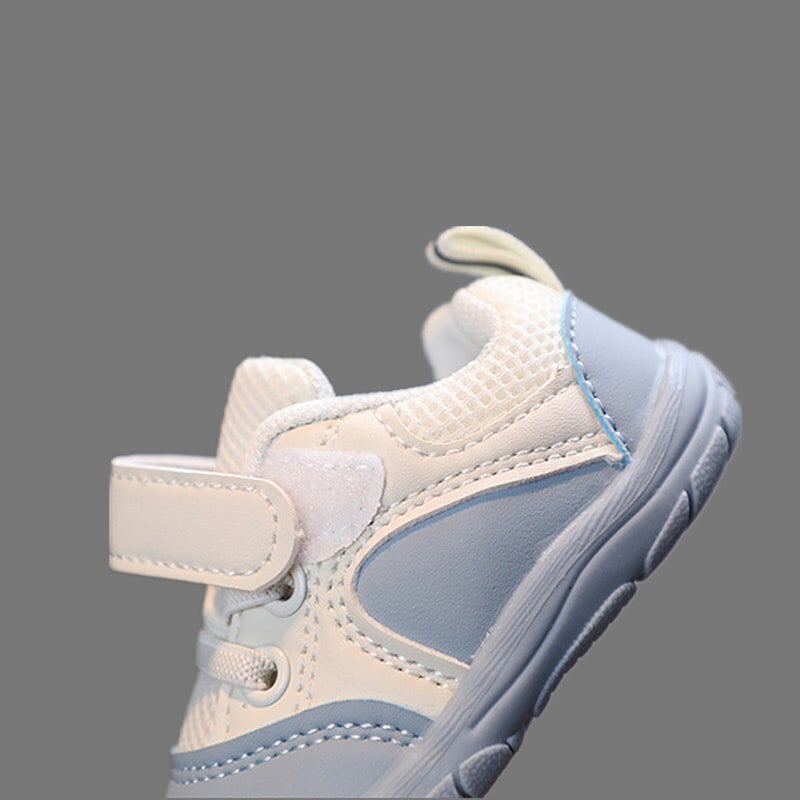 Baby wearing Barefoot Flexible Sole Walking Sneakers, demonstrating comfortable and anti-slip support for early steps.