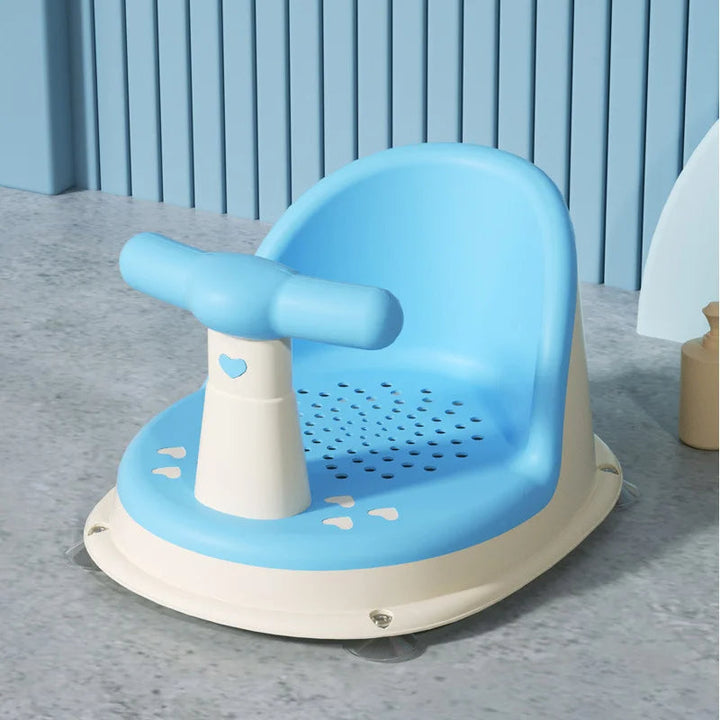Plastic baby bath seat with ergonomic backrest and non-slip suction base provides secure and safe bathing for infants.