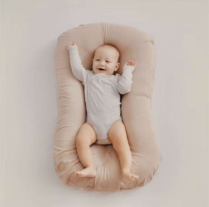 Gentle orthopedic baby support pillow, soft & breathable for infant comfort and nursery decor.