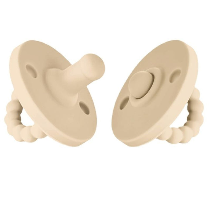 Silicone baby pacifier & teether for infants, providing soothing comfort & gentle teething relief for gums.