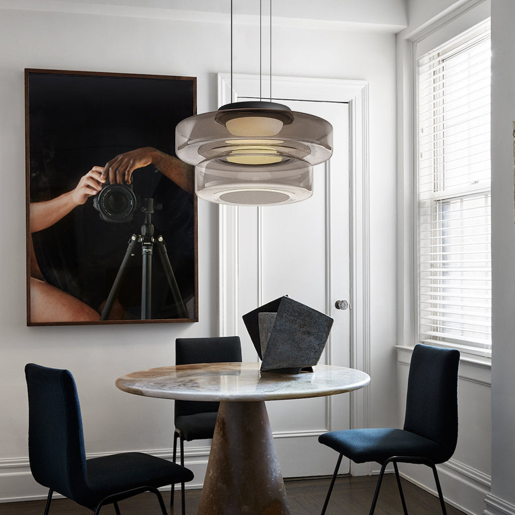 "Bauhaus style glass pendant light with sleek design enhances modern home decor, ideal for kitchens and living spaces."