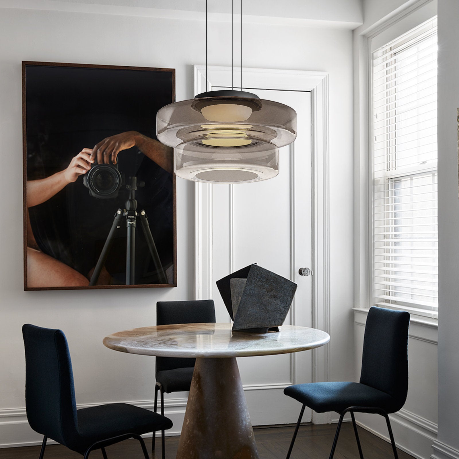 "Bauhaus style glass pendant light with sleek design enhances modern home decor, ideal for kitchens and living spaces."