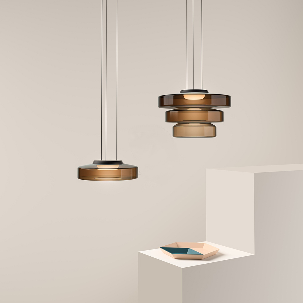 "Bauhaus style glass pendant light with sleek design enhances modern home decor, ideal for kitchens and living spaces."